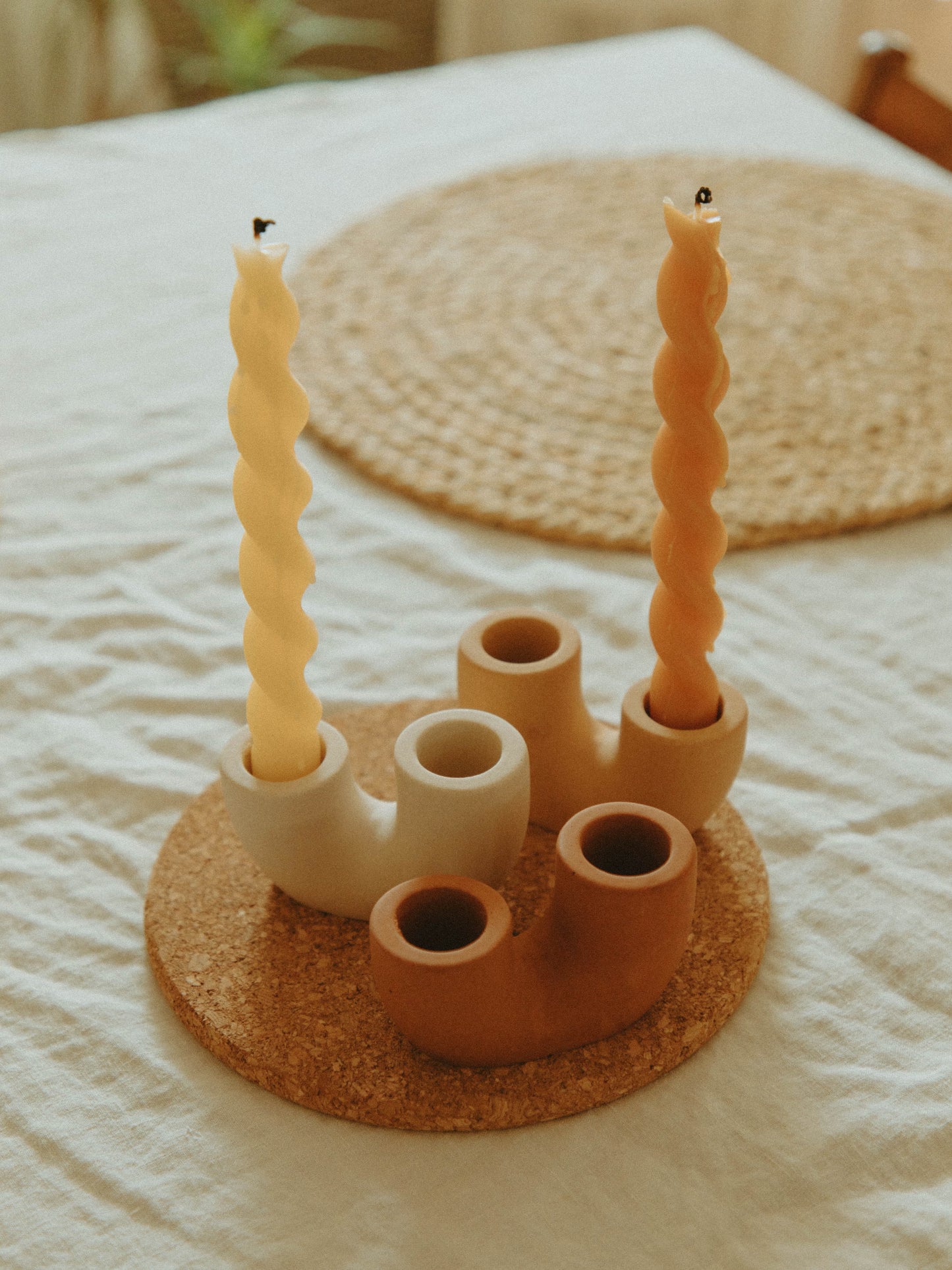 RISING CANDLE HOLDER